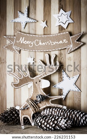 Merry Christmas Card with christmas deer/christmas decorations over grunge background