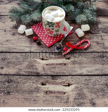 Winter cozy background with Marshmallow in the Cup of coffee.Cozy sweet Christmas background