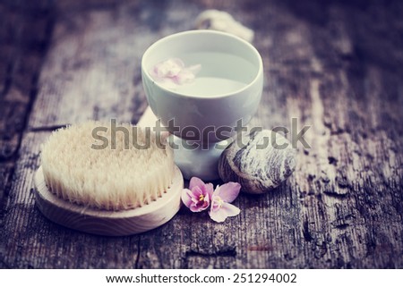 Spa concept background with flower, water and stone