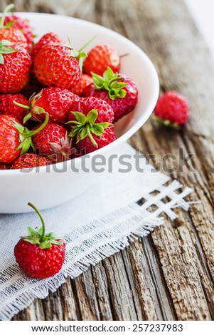 Berries on Wooden Background. Summer or spring Organic Berry over Wood. Agriculture, Gardening, Harvest Concept