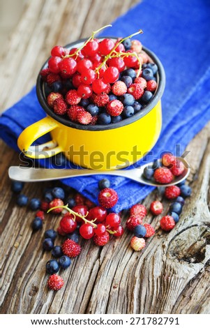 Berries on Wooden Background. Summer Organic Berry over Wood. Agriculture, Gardening, Harvest Concept