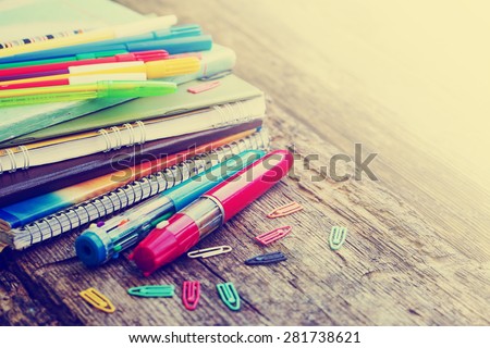 School supplies on wooden background