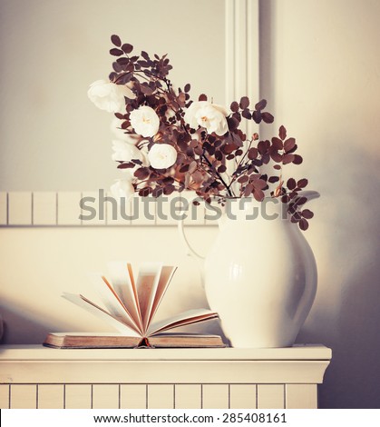 Vintage Bouquet of white roses in a vase on a white background