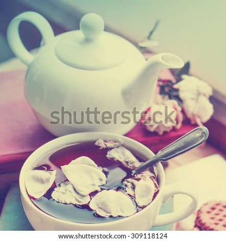 Rose tea/Healthy Tea with rose petals books and cookies