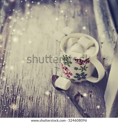 Hot Coffee cup on a frosty winter  background  /Christmas holidays background/ Winter cozy background