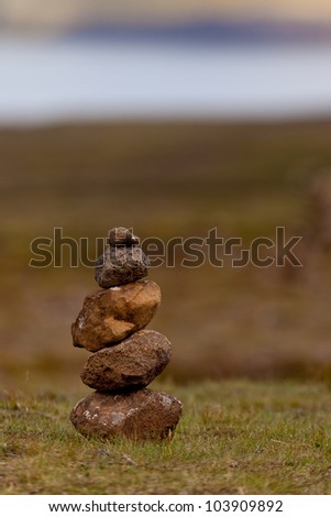 Pyramid of zen stones in nature