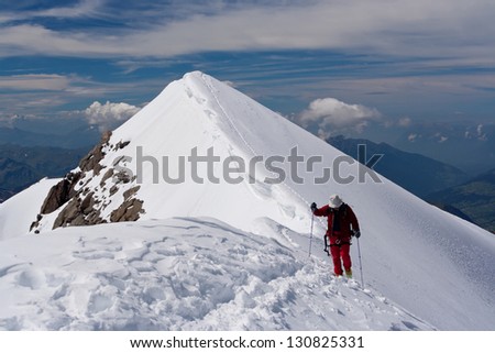 Climbing  the nowy  mountain ridge