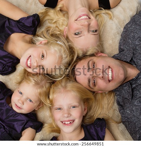 Closeup portrait of mother, father and their three daughters