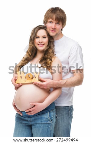 Young parents expecting their baby boy. Pregnancy. Isolated over white background