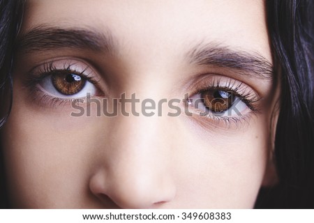 insightful look brown eyes