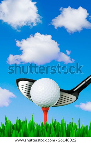 Golf ball on tee and a club ready for swinging in a beautiful green in a sunny day
