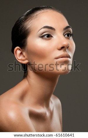 stock photo Beautiful female model with professional fashion makeup posing