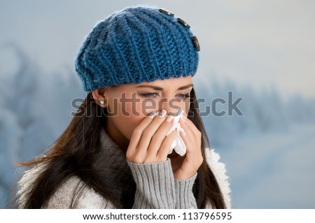 Pretty girl has flu and fever in winter day outdoor Pretty girl has flu and fever in winter day outdoor