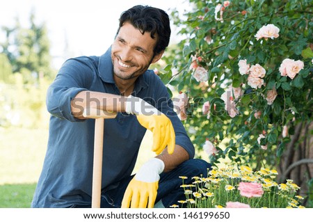 Happy Man Gardening Outdoor in Spring
