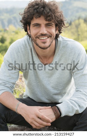 Portrait Of Smiling Young Man Outside