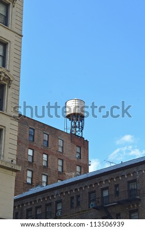 A Rooftop water tanks on a New York apartment building
