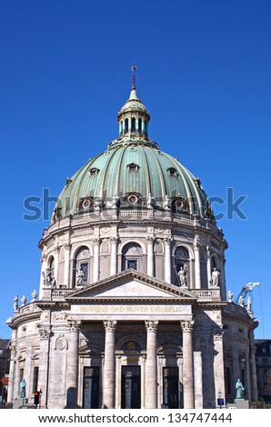 The front of The Marble Church on a sunny day in Copenhagen which is known for its architecture