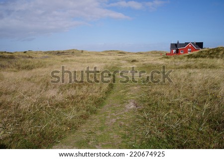 Traditional red danish holiday home on the Island of Romo close to Lakolk and the Wadden Sea