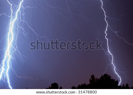 The flash of lightning in night sky