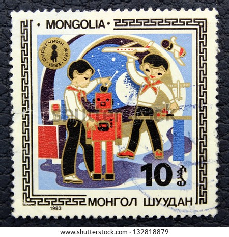 MONGOLIA - CIRCA 1983: A stamp printed in the Mongolia, shows  schoolboys making robots, circa 1983