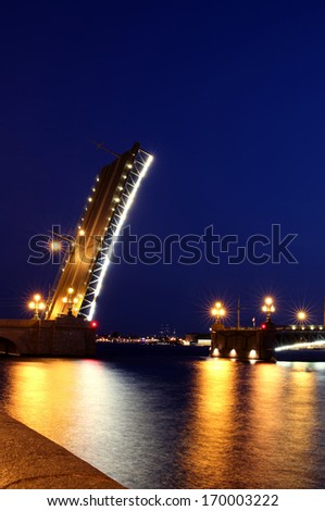 Drawbridge in St. Petersburg at night in the light of lanterns
