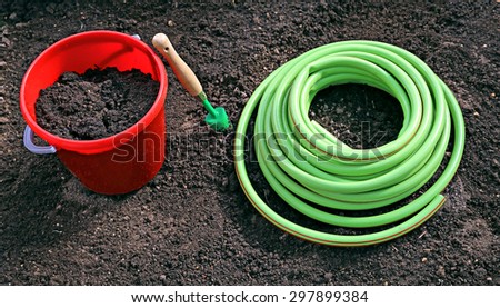 Horticulture accessories on the gardenbed in the garden