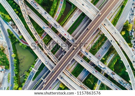 City transport X sign junction road aerial view with car movement, Transport industry