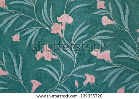 Stylish vintage flower on wallpaper in pastel