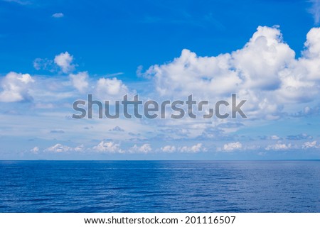 Summer landscape with sea and horizon over water