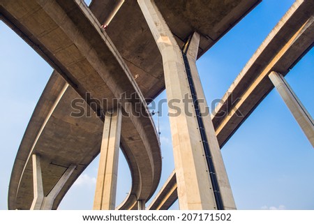 Concrete highway overpass Bhumibol Bridge in Thailand. The bridge crosses the Chao Phraya River twice.