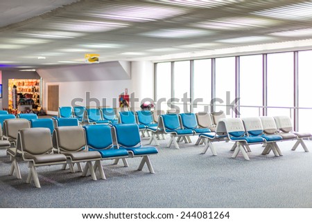 Bench in the hall of airport, empty bench