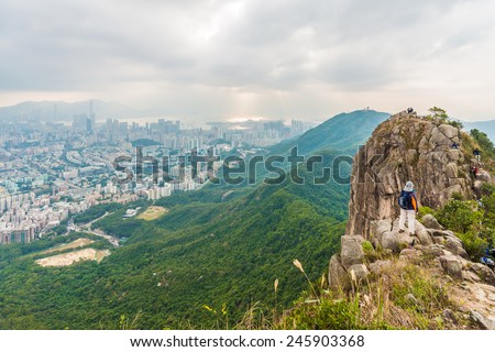 The Lion rock park, Hong Kong - 6 December 2014: People on the Lion Rock , is a hill in Hong Kong. It is located between Kowloon Tong in Kowloon and Tai Wai in the New Territories on 6 December, 2014.