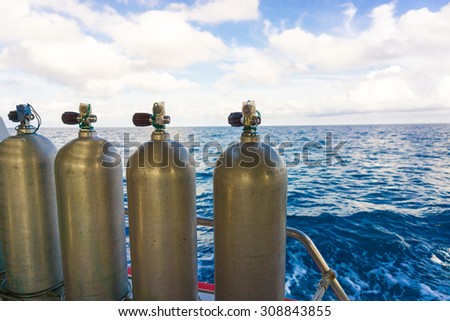 Oxigen tanks on boat for scuba diving, Diving equipment
