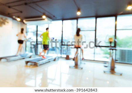 Abstract blur Modern fitness center with people, fitness gym background