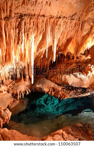 Stalactites over water in Fantasy Cave on Bermuda Island