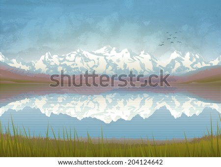 Beautiful mountain landscape with a clear lake and meadow