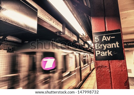 New York City subway passageway and sign to 5 Av. Bryant Park.