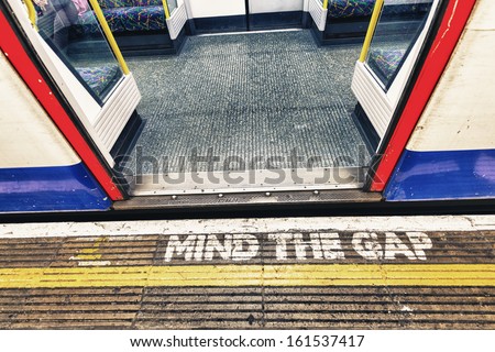 London underground sign mind tha gap London underground sign mind tha gap