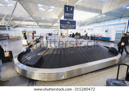 LONDON - JEN 14: Stansted Airport baggage claim area on Jenuary 14, 2015. It was the 4th busiest airport in the UK with 17.4 million passengers.