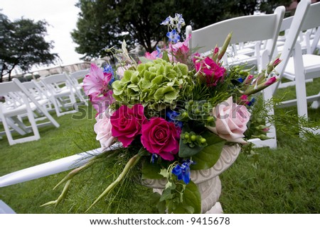 stock photo image of a flower decoration at an outdoor wedding