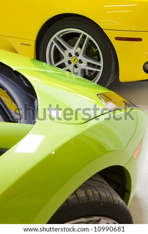 stock photo Italian sports cars in green and yellow Ferrari and 