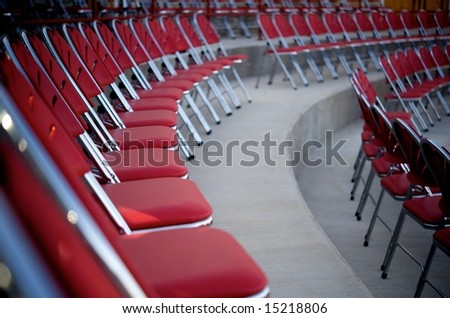 An image of red rows of chairs