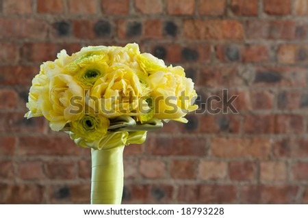 stock photo A colorful yellow bridal bouquet of flowers