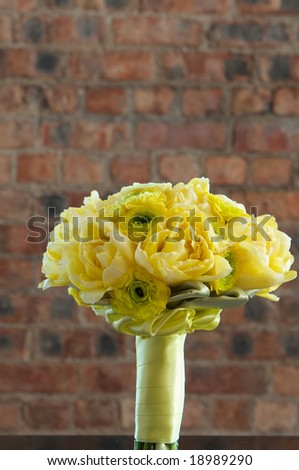 stock photo A colorful yellow bridal bouquet of flowers