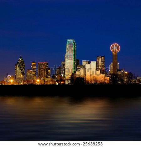 Dallas city skyline at night shot over the Trinity river
