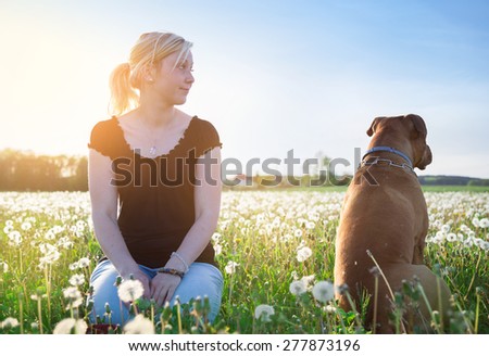 Dog is angry at the girl