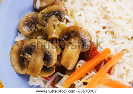 Chinese cooked rice with mushrooms and vegetables