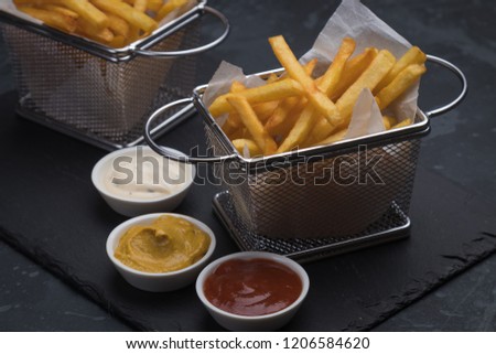 Home made french fries served in frying basket