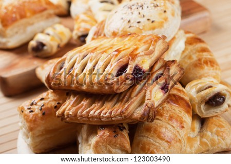 Puff pastry with sweet cream filling, selective focus
