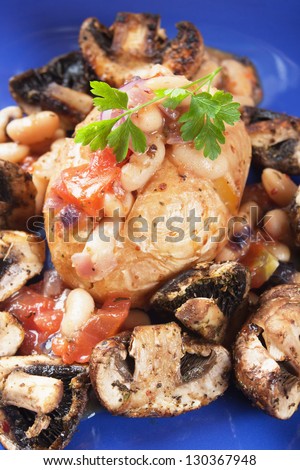 Jacket potato with white beans and mushrooms, healthy vegetarian meal